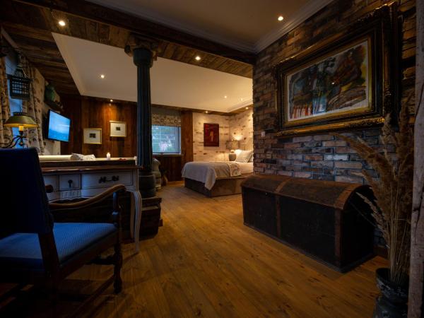 Paul's Fantasia Boutique Suites : photo 2 de la chambre suite lit queen-size deluxe