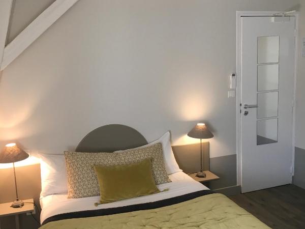 Hôtel L'Adresse : photo 4 de la chambre chambre lits jumeaux