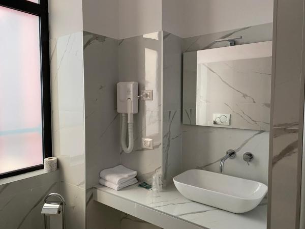 Oasi Village Hotel : photo 6 de la chambre chambre standard lit queen-size