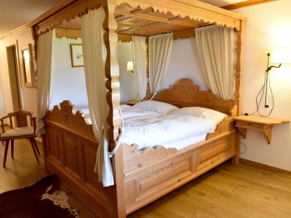 Hôtel de Ville : photo 10 de la chambre chambre lit king-size - vue sur montagne