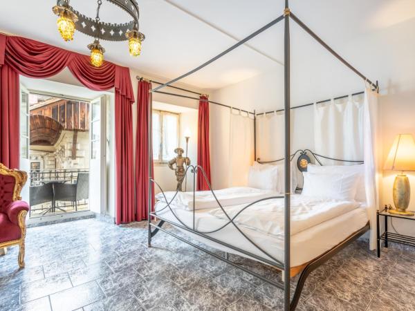 Altstadt Hotel Magic Luzern : photo 1 de la chambre suite cœur de lion avec bain à remous
