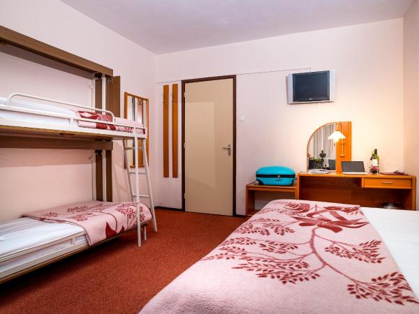 Owl Hotel : photo 2 de la chambre chambre quadruple