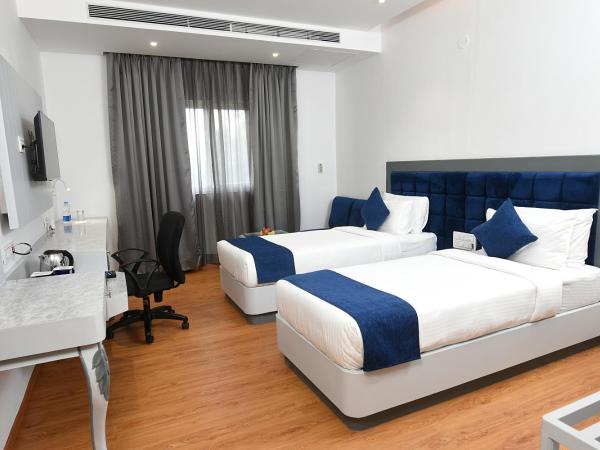 Kyriad Hotel Pimpri : photo 3 de la chambre chambre lits jumeaux supérieure