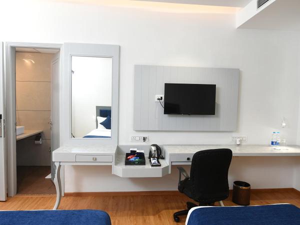 Kyriad Hotel Pimpri : photo 2 de la chambre chambre lits jumeaux supérieure