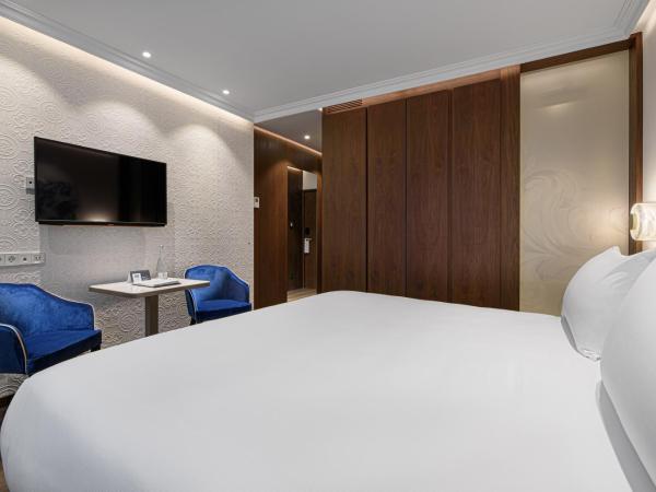 Eurostars Universal Lisboa : photo 10 de la chambre chambre deluxe double ou lits jumeaux