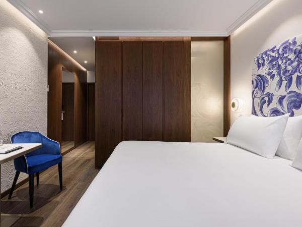 Eurostars Universal Lisboa : photo 9 de la chambre chambre deluxe double ou lits jumeaux