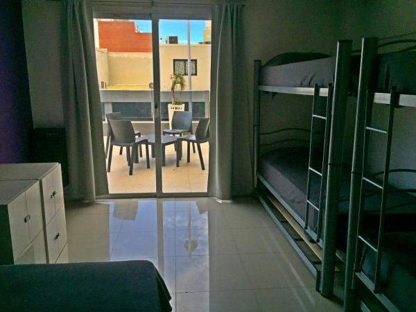 Link Cordoba Hostel : photo 5 de la chambre chambre quadruple avec terrasse 