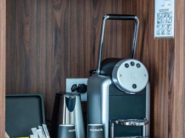 Nash Suites Airport Hotel : photo 6 de la chambre suite avec terrasse