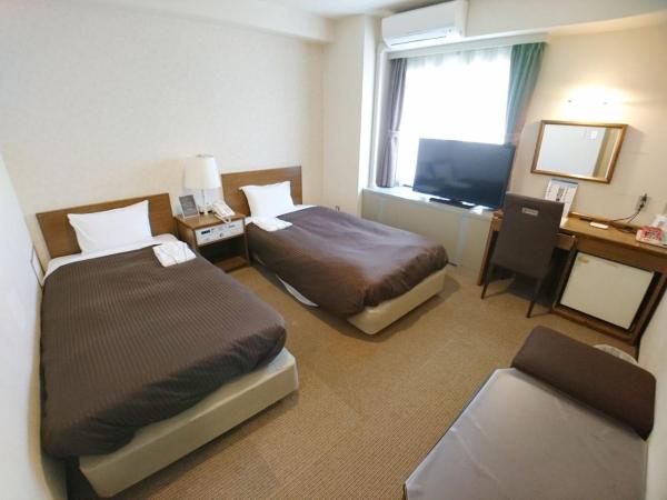Sky Heart Hotel Hakata : photo 2 de la chambre chambre lits jumeaux - fumeurs
