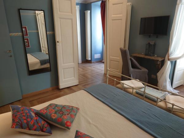 Ettore Manni B&B : photo 6 de la chambre chambre double avec lit d'appoint