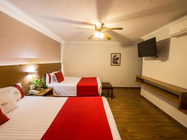 Del Marques Hotel and Suites : photo 9 de la chambre suite avec 2 lits queen-size