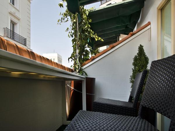 Preciados : photo 7 de la chambre chambre double ou lits jumeaux supérieure avec terrasse