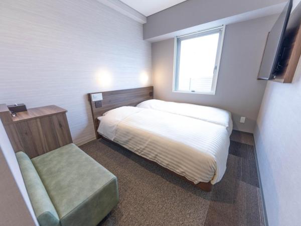 Super Hotel Tokyo Akabane Eki Minamiguchi : photo 1 de la chambre chambre lits jumeaux Économique