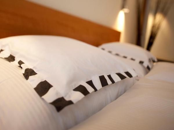 Hotel Allalin Saas-Fee : photo 5 de la chambre chambre triple supérieure