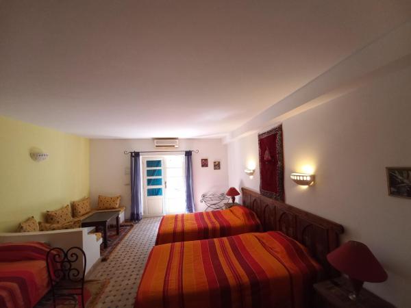 Les Tourmalines : photo 2 de la chambre chambre triple