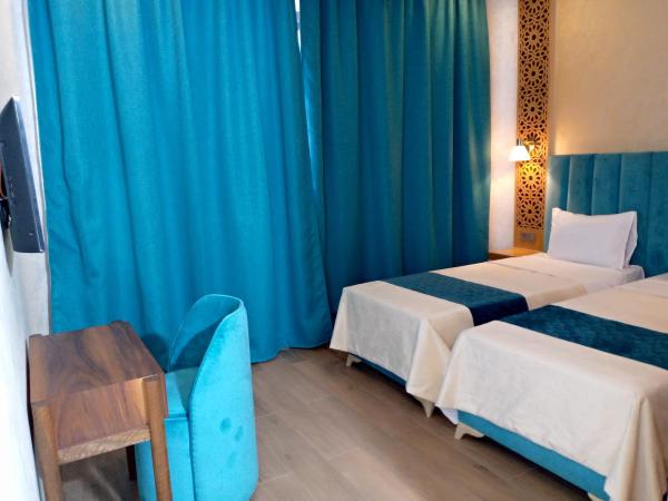 Palm's Motel : photo 5 de la chambre chambre lits jumeaux