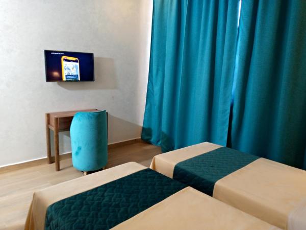 Palm's Motel : photo 4 de la chambre chambre lits jumeaux