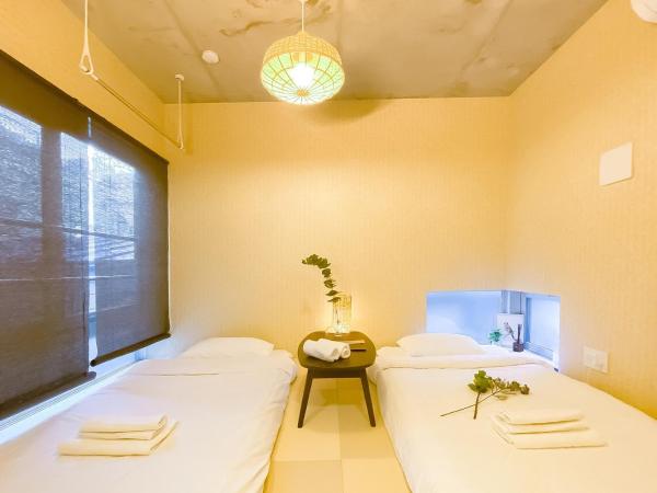 japan house nishishinjuku : photo 1 de la chambre chambre lits jumeaux avec salle de bains privative
