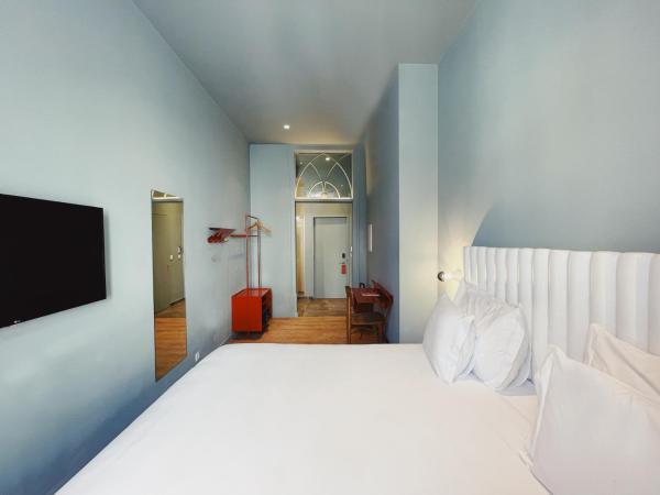 Esqina Cosmopolitan Lodge : photo 6 de la chambre chambre double ou lits jumeaux supérieure avec vue sur ville