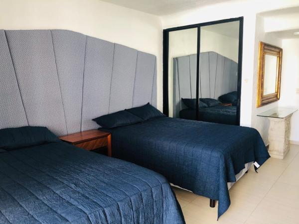 Acapulco Hotel y suites mediterrane : photo 3 de la chambre chambre lits jumeaux