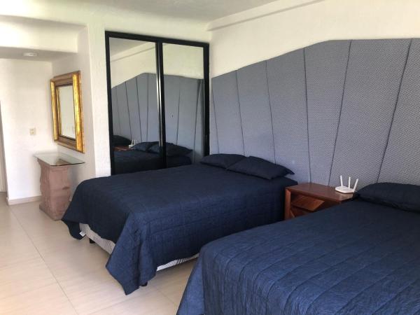 Acapulco Hotel y suites mediterrane : photo 7 de la chambre chambre lits jumeaux