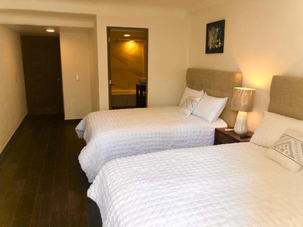 Acapulco Hotel y suites mediterrane : photo 4 de la chambre chambre lits jumeaux