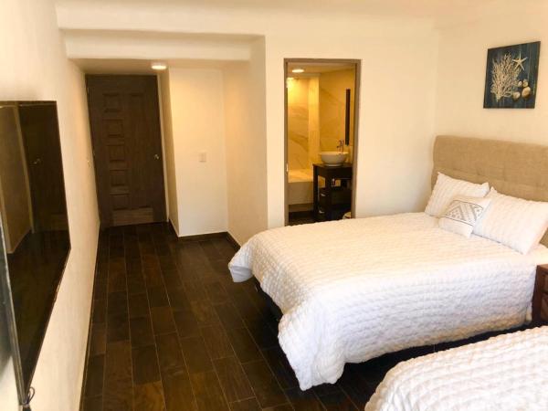 Acapulco Hotel y suites mediterrane : photo 5 de la chambre chambre lits jumeaux