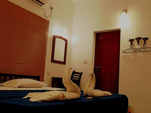 Janatha Homestay : photo 6 de la chambre chambre double ou lits jumeaux Économique