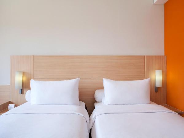 Sentral Cawang Hotel : photo 3 de la chambre chambre lits jumeaux standard