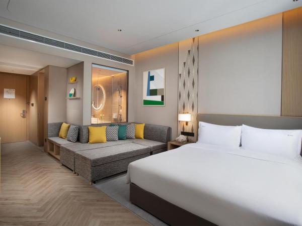 Holiday Inn Wuxi Central Station, an IHG Hotel : photo 2 de la chambre chambre lit king-size premium avec canapé-lit