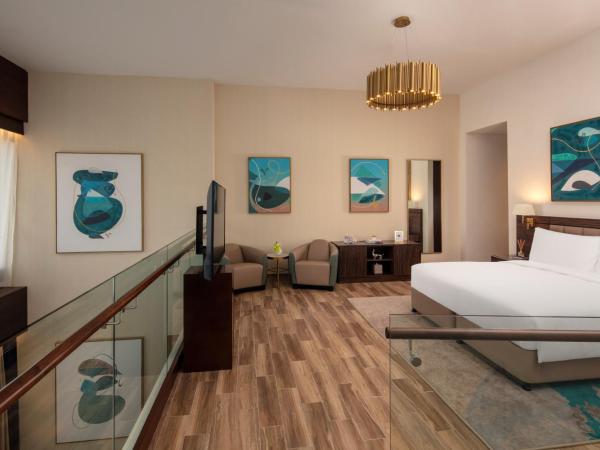 Avani Plus Palm View Dubai Hotel & Suites : photo 1 de la chambre appartement en duplex supérieur