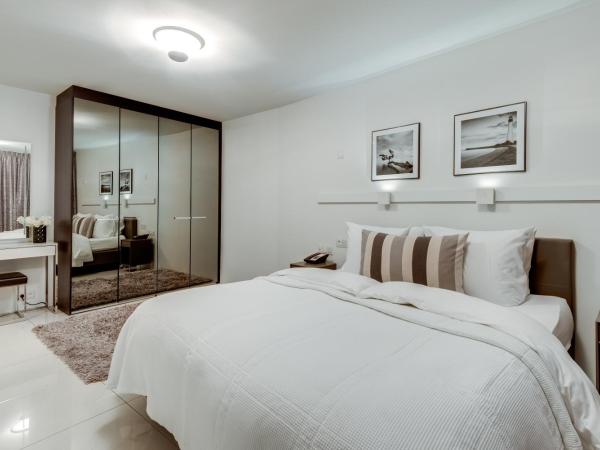 Black Pearl Apartment Hotel : photo 6 de la chambre suite en appartement de grand standing avec balcon