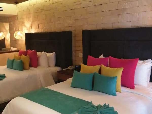 Hotel Beló Isla Mujeres - All Inclusive : photo 9 de la chambre suite junior de luxe avec 2 lits doubles