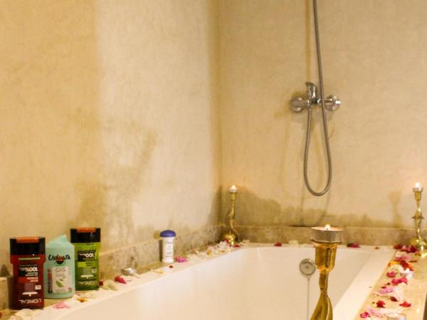 kasbah yu palace : photo 5 de la chambre chambre familiale - vue sur jardin