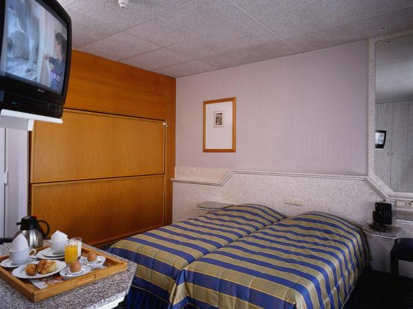 Hotel Glenmore : photo 1 de la chambre chambre lits jumeaux avec lit d’appoint - 301