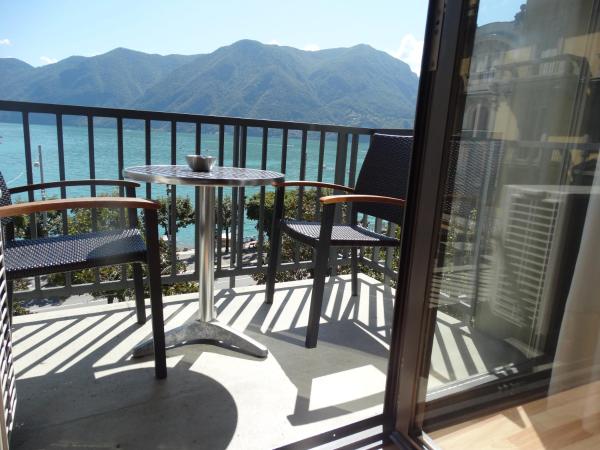 Swiss Lodge Nassa Garni : photo 1 de la chambre chambre double standard avec balcon - vue sur lac