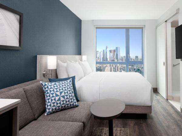 Hyatt Place NYC Chelsea : photo 6 de la chambre chambre lit king-size avec canapé-lit - vue sur horizon