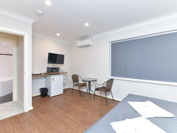 Platinum Motel : photo 1 de la chambre suite deluxe avec baignoire spa