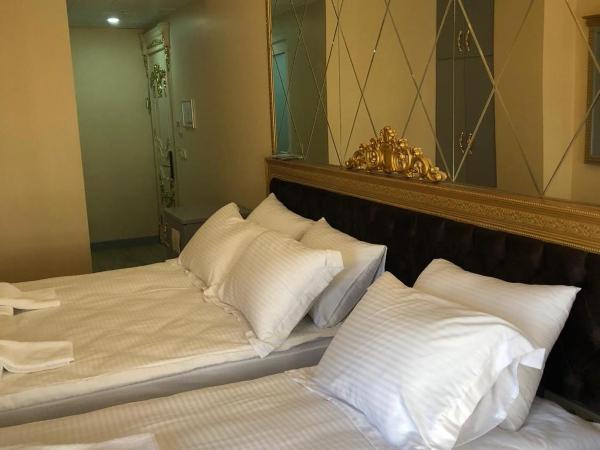 GOLDEN HİLL HOTEL DOWNTOWN : photo 1 de la chambre chambre triple classique