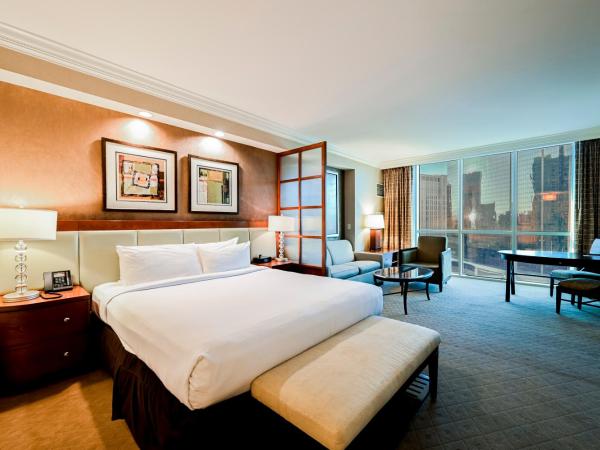 StripViewSuites at Signature : photo 6 de la chambre studio two-bedroom - strip view & balcony