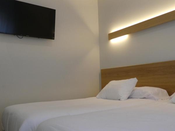 Plaza Pombo B&B - Hostal : photo 8 de la chambre chambre triple