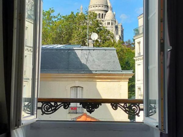 Le Village Montmartre by Hiphophostels : photo 3 de la chambre chambre triple - vue sur basilique du sacré-cœur