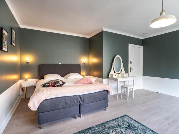 The Rose Suites : photo 1 de la chambre chambre familiale supérieure