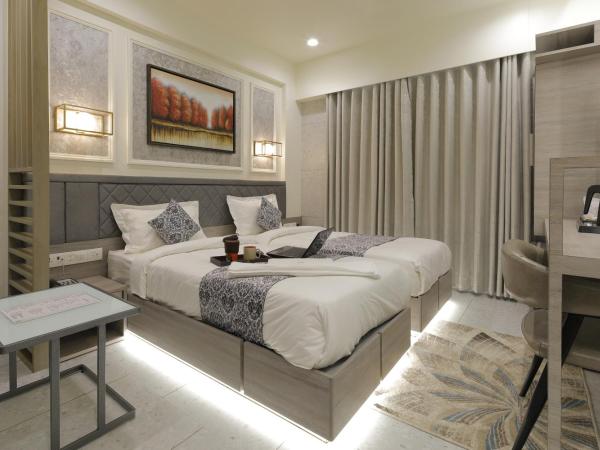 Hotel Elysian Residency : photo 8 de la chambre chambre deluxe double ou lits jumeaux