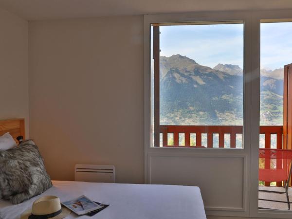 SOWELL Family La Lauzière : photo 2 de la chambre chambre lits jumeaux avec balcon