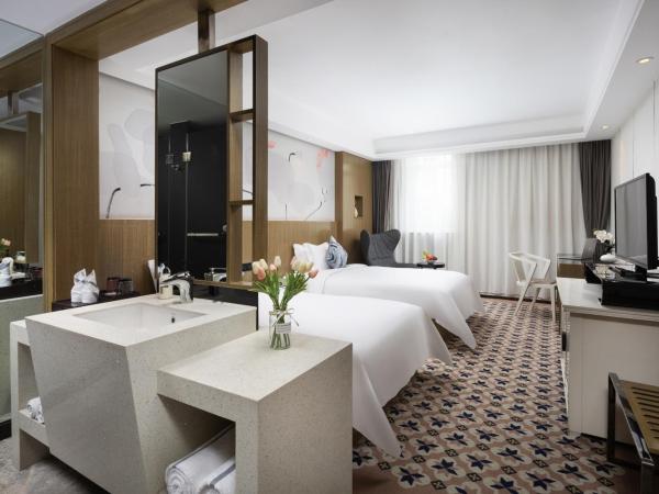 Paco Hotel Gangding Metro Guangzhou-Free Shuttle Bus during Canton Fair : photo 2 de la chambre chambre lits jumeaux deluxe