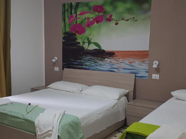 La fleur : photo 3 de la chambre chambre familiale avec salle de bains privative