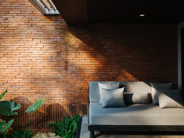 Cross Chiang Mai Riverside - formerly X2 Chiang Mai Riverside : photo 8 de la chambre suite - vue sur jardin