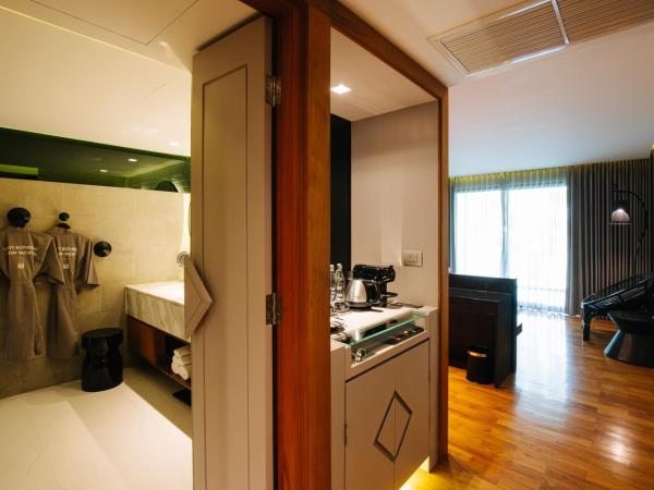 Cross Chiang Mai Riverside - formerly X2 Chiang Mai Riverside : photo 7 de la chambre suite - vue sur rivière