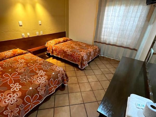 HOTEL BUGAMBILIAS : photo 5 de la chambre chambre standard avec 2 lits queen-size